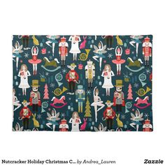 a blue christmas themed placemat with nutcrackers and angels