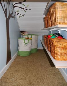 two baskets are sitting on the shelves next to each other