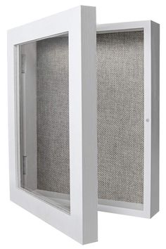 a white wall mounted cabinet with two doors and one door open to the other side