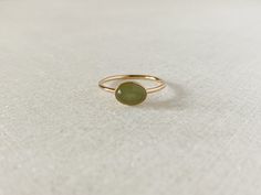 Each ring will be handmade to order in your size. *Please allow some color and shape variation since it is a natural stone. ::Details:: Gemstone: 6x8mm (small, may appear larger in the photos) Band: 1.3mm Setting: horizontal by default. Please let me know if you prefer a vertical setting instead. Green aventurine is a member of the quartz family. It is believed to bring good luck, optimism and inspire an individual to take action and seek new opportunities in life. Dainty Green Oval Ring, Green Oval Dainty Rings, Minimalist Green Oval Stackable Rings, Aventurine Ring, Ring Minimal, Minimal Ring, Green Gift, Ringe Gold, Sterling Silver Rings Bands