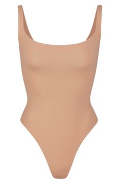 Sculpt your body's natural shape with a sleeveless bodysuit from Kim Kardashian West's SKIMS that holds you in and lifts you up in all the right places. Reflecting the brand's passion for highly technical shapewear solutions for every body, this everyday piece has a whisper-soft, seamless construction, high-cut legs and thong back that remains invisible under clothing. Style Name:Skims Fits Everybody Square Neck Sleeveless Bodysuit (Regular & Plus Size). Style Number: 6125045. Seamless Scoop Neck Shapewear, Solid Square Neck Bodysuit With Lined Body, Fitted Seamless Beige Bodysuit, Fitted Square Neck Seamless Bodysuit, Skims Fits Everybody Bodysuit, Yellow Fits, Square Neck Bodysuit, Neck Stretches, Sleeveless Bodysuit