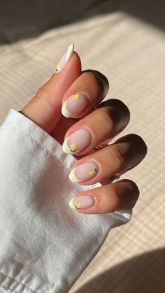 Discover the latest trends in spring nails for 2024! Embrace floral designs that are cute, simple, and perfect for short almond nails. Elevate your nail game with the freshness of spring and adorn your fingertips with blooming beauty. Explore the epitome of nail art sophistication with these trendy and adorable ideas. #SpringNails #SpringNails2024 #FloralNails #CuteNailDesigns #ShortAlmondNails Lemon Tip Nails, Simple Nail Art Almond Nails, Lemon French Tip Nails, French Inspired Nails, Nails Europe Summer, Cute Funky Nails Short, Gel Nails Simple Design, Fruit French Tip Nails, Simple Nails 2024