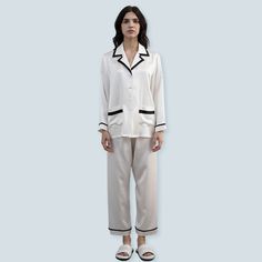 Free Shipping on orders $45+   
  First Order 10 % OFF, CODE: DAISYSILK   
  FREE Scrunchy or Eye Mask Gift on Orders $100+   
  (No Code Needed)    Daisysilk’s pajamas/loungewear/robe will make lazy Sunday mornings a little bit more luxurious. Cut from pure mulberry silk, this two-piece has a camp collar and one patch pocket traced with traditional piping, and two side pockets for your essentials. The relaxed fit and elasticated waistband ensure the trousers won't feel restrictive when you're White Silk Sleepwear For Night, White Silk Pajama Set, Elegant Cream Sleepwear For Home, White Silk Sleepwear, White Silk Sleepwear Nightwear, White Silk Sleepwear For Bedtime, Cream Silk Sleepwear, White Silk Long Sleeve Sleepwear, Silk V-neck Sleepwear For Evening