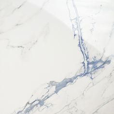 the marble is white and has blue streaks on it