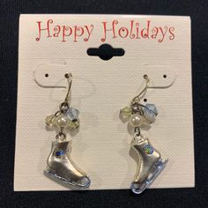 pair of silver shoes earrings with crystal beads