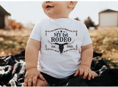 Celebrate your little one's first birthday in style with matching Rodeo 2022 t-shirts for the whole family! These cute unisex Rodeo birthday tees are the perfect way to mark this special milestone in your child's life. With the matching design, your family will look picture-perfect making for a memorable and adorable photo opportunity! ♡ Each shirt is sold separately ---------------------------------- S H I R T - D E T A I L S ---------------------------------- - 100% Soft cotton tees - Adult sh Rodeo First Birthday Shirt, Rodeo Birthday Party Boy Shirt, My First Rodeo Birthday Boy Shirt, My First Rodeo Birthday Family Shirts, My First Rodeo Birthday Boy, Mommy And Me Tshirts, My First Rodeo Shirt, First Rodeo Shirt, My 1st Rodeo