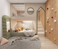 a bedroom with climbing walls and stuffed animals on the floor, in front of a staircase