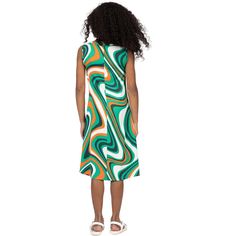 Our vibrant Green Print Sleeveless Pockets Dress, a chic and playful addition to your little ones wardrobe. Crafted with care, this dress features a bold green and orange print that adds a pop of color and fun to any ensemble. Designed with a sleeveless, loose relaxed fit, it ensures comfort and freedom of movement for all day wear, making it perfect for summer adventures and springtime outings. Complete with convenient side pockets, it effortlessly combines style and functionality, providing sp Trendy Sleeveless Dress With Vibrant Print, Playful Orange Sleeveless Dress, Playful Multicolor Sleeveless Dress For Spring, Playful Multicolor Sleeveless Summer Dress, Green Casual Knee-length Sleeveless Dress, Casual Green Knee-length Sleeveless Dress, Casual Green Sleeveless Knee-length Dress, Playful Green Dress For Beach, Playful Green Dresses For Beach