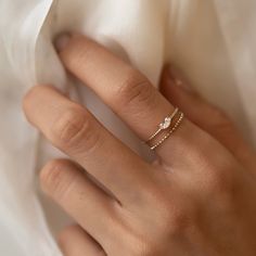 A modern and chic tiny heart design. Wear alone for a minimal look or stack with our other designs as pictured., .925 Sterling Silver Hypoallergenic, lead and nickel free Heart Width: 5.5mm x Height:3.5mm Rope Band: 1mm #R098 Rings Minimal, Minimal Ring, Dainty Gold Rings, Dope Jewelry, Tiny Heart, Handcrafted Rings, Handmade Rings, Cute Rings, Hand Jewelry