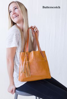 "The small version of our best selling leather tote, this women's tote bag is handmade with the finest american full grain leather and craftsmanship. Better quality than name brands at half the cost. Every tote comes with an interior panel with (2) pockets (1 magnetic snap, 1 zippered). An optional front pocket, zipper, and tassel are available. WHY LIFETIME? * Handmade in Arizona, USA * Authentic Full Grain Leather * Personalization Available (up to 4 Letters) * Lifetime Warranty FEATURES * Per Small Leather Bag, Genuine Leather Totes, Monogram Tote, Small Handbag, Leather Bag Women, Small Handbags, Bag For Women, Womens Tote, Leather Tote Bag