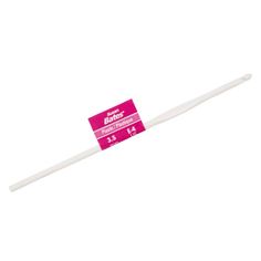 a white stick with pink writing on it