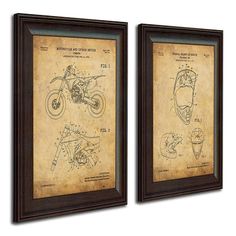 two framed drawings of motorcycles on display