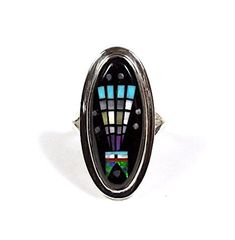 (Guaranteed 100% Sterling Silver) High quality 925 sterling silver ring with natural genuine multicolor stones. The ring is handcrafted and the stones are inlaid together to create this beautiful Southwestern piece of art jewelry. The stones consist of natural  Black Onyx, Coral, Mother of Pearl, and Fire Opals. The top of the ring measures 1-1/4'' x 5/8''. Our silver is genuine 925 sterling silver. You will receive the item in a gift box. Thanks for looking and check out more items in my Etsy s Multicolor Oval Hallmarked Ring, Oval Multicolor Hallmarked Ring, Multicolor Collectible Ring Jewelry, Multicolor Polished Finish Ring Jewelry, Multicolor Polished Ring Jewelry, Black Ring With Inlay, Black Rings With Inlay, Unique Multicolor Rings With Polished Finish, Black Inlay Round Ring