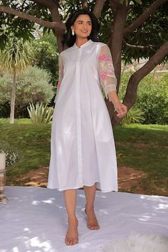 White shirt dress, elevated with sheer sleeves and floral hand embroidery using sequins, thread. - Aza Fashions Feminine Spring Dress With Resham Embroidery, Eid Long Sleeve Dresses With Set-in Sleeves, Spring Long Sleeve Embroidered Shirt Dress, Embroidered Long Sleeve Shirt Dress For Spring, Spring Embroidered Long Sleeve Shirt Dress, Spring Wedding Dress With Embroidered Sleeves, Long Sleeve Floral Embroidery Shirt Dress For Spring, Long Sleeve Shirt Dress With Floral Embroidery For Spring, Fitted Spring Embroidered Dress With Resham Work