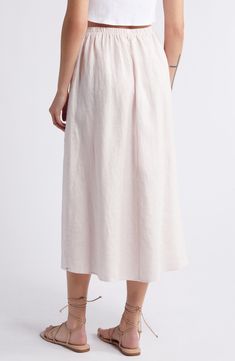 Fashioned with an easy elastic waist and handy pockets, this lightweight skirt made from airy linen is a warm-weather essential. 33" length Elastic waist Side-seam pockets 100% linen Machine wash, tumble dry Imported Linen Flowy Skirt For Vacation, Flowy Linen Skirt For Vacation, Feminine Relaxed Maxi Skirt For Beach, Linen Lined Skirt For Vacation, Feminine Relaxed Fit Maxi Skirt For The Beach, Feminine Maxi Skirt For Beach, Relaxed Linen Maxi Skirt For Vacation, Linen Long Skirt For Vacation, Linen Skirt For Vacation