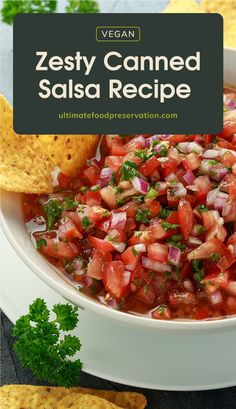 a white bowl filled with salsa next to tortilla chips and cilantro