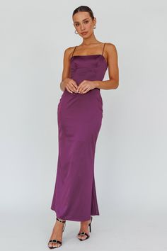 Plum maxi dress Half lined Adjustable straps Lace-up back Zipper in side Steal the show in our stunning Teneal maxi dress. We are loving the lace-up back feature! Perfect for a special event or a birthday celebration. Team it with diamante mules and a clutch for an unforgettable look. MODEL INFO Model is wearing size XS Height: 5'6" Bust: 31.5" Waist: 24.5" Hips: 34.5" CARE Hand Wash Cold. Do Not Iron. MATERIAL SPANDEX/POLYESTER Plum Gown, Purple Bridesmaid Dress, Selfie Leslie, Purple Bridesmaids, Garden Dress, Blue Bridesmaids, Iron Material, Date Night Dresses, Mini Dress Casual