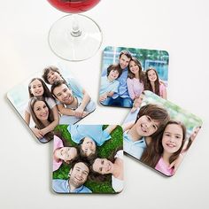 four coasters with pictures of people on them and a wine glass next to them