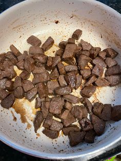 chopped meat in a bowl on a table