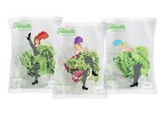 three bags of lettuce are shown in this image