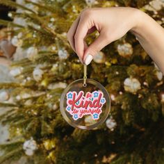 Introducing our "Be Kind to Yourself" Glass Christmas Ornament, a heartfelt reminder to embrace self-compassion and spread positivity during the holiday season and beyond. This elegant and meaningful ornament is designed to inspire and uplift, making it a perfect addition to your holiday decor or a thoughtful gift for someone special.  NOTE -Comes with string, ready to hang SIZE  - 2.76 x 2.76 inches  - 0.15" Thick (4mm) ABOUT THE ITEM  - Ceramic  - Front design - Rounded smooth edges  - Hanging Jordan Shop, Spread Positivity, Smooth Edges, School Counselor, Glass Christmas Ornaments, Be Kind To Yourself, Health Awareness, Christmas Tree Ornament, Mental Health Awareness