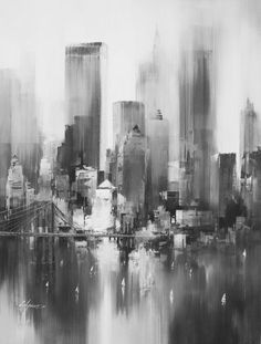 black and white photograph of cityscape with water