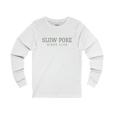 This classic unisex long sleeve tee fits like a well-loved favorite. Casually elegant with an excellent quality print, it is an irreplaceable everyday item for anyone.  100% airlume combed and ringspun cotton (fiber content may vary for different colors) Light fabric  Retail Fit Runs true to size Long Sleeve T-shirt With Lettering, White Long Sleeve T-shirt With Lettering, White Long Sleeve Tops With Lettering, One Happy Camper, Outdoorsy Gifts, Women Hiking, Hiking Tshirt, Her And Him, Hiking Gifts