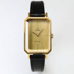 Brand Name: Omega Model: De Ville Rectangular (511.0378) Year: 1970s Movement: Manual-Winding Case Material: Gold-plated (20 microns) stainless steel (SS) Crystal: Sapphire-Crystal Dial Color: Gold Dimensions: Case width (approx.): 25x32 mm, Bracelet length (approx.): 17 cm, Lug width (approx.): 12.6 mm, Lug to Lug: 41.1 mm  Features: 20 microns Gold-Plated case, Sapphire-Crystal, Manual-Winding, Unique and Elegant rectangular Case, Diamond look Crystal, Swiss Made, Original Ω signed crown, Orig Retro Gold Watch With Rectangular Dial, Retro Gold Watches With Rectangular Dial, Gold Minimalist Watch Accessories For Business, Vintage Rectangular Analog Watches, Vintage Rectangular Analog Watch, Gold Watch Accessories With Rectangular Analog Dial, Retro Gold Rectangular Watches, Gold Rectangular Watch With Analog Display, Gold Rectangular Analog Watch Accessories