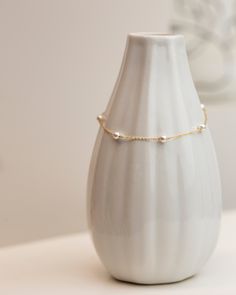 Perfect for everyday and layering!Simple and delicate bracelet - Perfect for Stacking & Layering or even alone.Featuring Swarovski pearl stations with dainty Gold Fill or Sterling Silver chain. Perfect bridesmaids gift or for bridal jewelry. • Pearl measures approx. 4mm• 1" Adjustable chain• Sterling silver or Gold filled• Swarovski pearls• Perfect gift for Bridesmaids and Bride Dainty Pearl Chain Beaded Bracelets For Formal Occasions, Dainty Pearl Beaded Bracelets For Formal Occasions, Dainty Pearl Bracelet With Pearl Charm For Formal Occasions, Dainty Pearl Chain Bracelet For Formal Occasions, Elegant Pearl Drop Chain Bracelet Gift, Dainty Pearl Drop Bracelets For Formal Occasions, Elegant Bracelet With Satellite Chain As Gift, Elegant Everyday Chain Bracelet With Pearl Drop, Silver Pearl Chain Bracelet As Gift