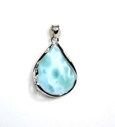 "Brand new high quality handcrafted 925 sterling silver Pendant with natural genuine rare Larimar gemstones set on solid 925 sterling silver and stamped with 925. This beautiful blue Larimar stone is mined from Dominican Republic. The Larimar is AAA grade quality and not treated or enhanced. The marbled blue and white hues resembling the Caribbean Ocean is what makes this pendant unique in itself. Our silver is genuine 925 sterling silver and rhodium plated for better quality and prolonged shine. Pendant measures 1-3/8\" ( 36mm )long and 13/16\" ( 20mm ) wide. You will receive item in a gift box. Thanks for looking and check out more items in my Etsy shop for more great items and deals! https://www.etsy.com/shop/925usa Payment: We accept all major credit cards through direct check out and Nickel-free Larimar Silver Jewelry, Gift Larimar Jewelry Stamped 925, Teardrop Larimar Jewelry Gift, Stamped 925 Larimar Jewelry For Gift, Silver Teardrop Larimar Jewelry, Blue Larimar Teardrop Jewelry, Blue Teardrop Larimar Jewelry, Blue Cabochon Drop Jewelry, Blue Drop Cabochon Jewelry