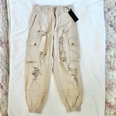 Nwt Carmar Cargo Pants. Retail Was $210. The Color Is Called Camel. Fall Cream Cargo Pants With Pockets, High Rise Cream Bottoms With Pockets, Beige Cargo Style Tapered Leg Pants, Cream High Rise Bottoms With Pockets, High-rise Cream Bottoms With Pockets, Neutral Mid-rise Bottoms With Pockets, High Rise Beige Cargo Bottoms, High Rise Beige Cargo Style Bottoms, High Rise Beige Cargo Pants