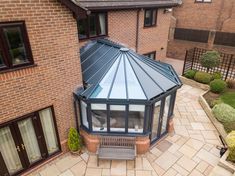 an aerial view of a building with a glass roof