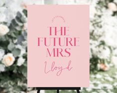 a pink sign with the words'the future mrs lloyd'in cursive font