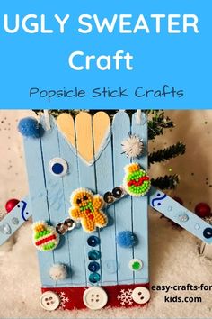 a popsicle stick craft is made to look like a ugly sweater