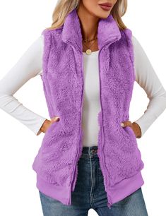 PRICES MAY VARY. ❤Plush and cozy like your favorite blanket but styled for everyday wear, the women's full zipper pockets sherpa fleece vest is a go-to layer for cool-to-cold days at the park or a tailgate. Sleeveless fleece vest jackets for women, causal fleece zip up vest, ladies fleece lounge pockets vest. ❤Features: Womens fall/ winter vest, is made out of fleece, plus hip length, tall, stand-up collar and full, front zipper design which offering plush comfort and warmth, side pockets stash Trendy Sleeveless Vest For Cold Weather, Winter Sleeveless Vest With Fleece Lining, Sleeveless Vest With Fleece Lining For Winter, Cozy Winter Vest For Cold Weather, Fall Fleece-lined Sleeveless Vest, Fall Sleeveless Vest With Fleece Lining, Sleeveless Fleece-lined Vest For Fall, Casual Fall Vest With Fleece Lining, Trendy Winter Vest For Cold Weather