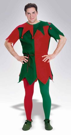 a man in an elf costume standing with his hands on his hips