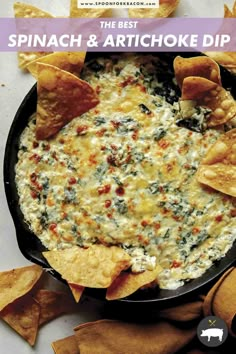 spinach and artichoke dip in a skillet with tortilla chips