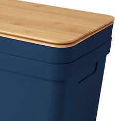 a large blue box with a wooden lid