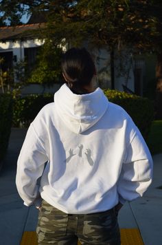 O.G White Nightmare logo hoodie. Our cotton hoodie is lined with versatile white reflective fabric. The reflective logo design features a collection of hands reaching dreams/goals. Perfect for lounging, activewear, events, and meetings. Stay warm, stay fly, you're their worst Nightmare. White Stretch Hooded Hoodie, White Hoodie With Drawstring For Gym, White Gym Hoodie With Drawstring, White Stretch Hoodie With Ribbed Cuffs, White Stretch Hoodie In Athleisure Style, White Stretch Athleisure Hoodie, Stretch Sweatshirt With Kangaroo Pocket For Streetwear, Stretch Hoodie For Hip Hop Streetwear, Stretch Hoodie With Kangaroo Pocket For Streetwear