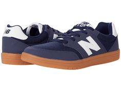 New Balance Numeric 425 - Skate Shoes : Navy/Gum : Move with ease from the boardwalk to the bar in the New Balance Numeri 425 sneakers! Coastal-inspired court shoes taking cues from the 520 and 620 styles. Uppers of durable faux-suede and breathable mesh. Lace-up closure. Padded insole for all-day comfort. Non-marking rubber outsole offers long-lasting wear. Imported. Measurements: Weight: 13 oz Product measurements were taken using size Men's 12, Women's 13.5, width D - Medium. Please note that Sporty Fade-resistant Skate Shoes With Round Toe, Sporty Fade-resistant Round Toe Skate Shoes, Sporty Slip-resistant Skate Shoes With Round Toe, Slip-resistant Round Toe Skate Shoes For Sports, Sporty Fade-resistant Sneakers For Skateboarding, Casual Slip-resistant Skate Shoes For Streetwear, Sporty Lace-up Skate Shoes With Rubber Heel Cap, Sporty Slip-resistant Skate Shoes With White Sole, Sporty Slip-resistant Skate Shoes For Skateboarding