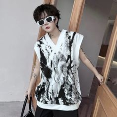 45784973017310|45784973050078|45784973082846 Trendy White V-neck Tank Top, White V-neck Vest Top, Modern Sleeveless White Tops, Modern White Sleeveless Tank Top, Modern White V-neck Top, Trendy White Sweater Vest For Summer, Trendy White Summer Sweater Vest, White V-neck Vest For Spring, Spring White V-neck Vest