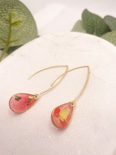 Polymer clay and resin earrings. Super lightweight, stylish and durable. Made with hypoallergenic alloy, stainless steel, brass, gold filled or gold plated components. Please inquire for specifics.  pink delight collection - inspired by rose turkish delight Handmade Statement Dangle Earrings with pink and red alcohol ink and gold details. Finished with glossy resin for light catching shine.  Each piece is completely handmade so no two are exactly the same, each piece is truly unique!    A beauti Trendy Nickel-free Linear Earrings For Gifts, Modern Dangle Threader Earrings As Gift, Modern Gold Threader Earrings As Gift, Trendy Long Drop Jewelry For Gift, Nickel-free 14k Gold Filled Threader Earrings As Gift, Modern 14k Gold Filled Linear Earrings Gift, Gold Linear Earrings For Gift, Adjustable Hypoallergenic Gold Linear Earrings, Gold Drop Threader Earrings As Gift