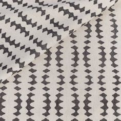 a black and white pattern on fabric