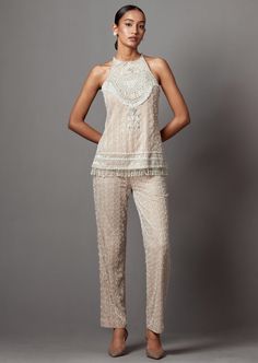 Hand embroidered statement hi-shine co-ord pant top set. Elegant Embellished Summer Pants, Beige Embellished Party Sets, Chic Embellished Bottoms For Wedding, Chic Embellished Wedding Bottoms, Glamorous Embellished Bottoms For Wedding, Glamorous Embellished Pants For Wedding, Elegant Embellished Bottoms For Festive Occasions, Elegant Festive Embellished Bottoms, Summer Festive Embellished Pants