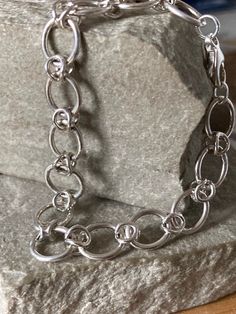 A Modern chunky Silver oval link bracelet,    oval links 12mm x 10mm with a decorative wire connecting link , silver trigger  fastener, 19cm  long , 925 Silver Green Agate Ring, Silver Money Clip, Cluster Pendant, Agate Ring, Classic Gold, Diamond Cluster Ring, Pearl Ring, Chain Link Bracelet, Infinity Bracelet