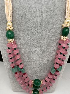 Pink Pumpkin Beads and Green Beads Multi Layer Necklace Only Neckalce no earringsColor : GoldenSize : Necklace Length : 22 Inches Approx;Stones : Pearl Real Emeralds Rose Quartz Nakshi Balls Bridal Necklace With Colorful Round Beads, Festive Faceted Oval Beads, Festive Oval Faceted Beads, Festive Multi-strand Faceted Beads, Multicolor Pearl Jewelry With Faceted Beads, Festive Faceted Multi-strand Beads, Traditional Pink Necklaces With Colorful Beads, Party Pearl Necklace With Round Gemstone Beads, Traditional Pink Jewelry With Colorful Beads