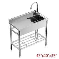 a stainless steel sink with two faucets under it