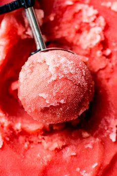 a scoop of ice cream with powdered sugar on top