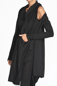 FREE EXPRESS SHIPPING to the U.S. for orders over 35$*   Extravagant Multi functional Cardigan vestWith draped front lapels and asymmetric cutOff/On Long sleevesProvides an intriguing and stylish finish to any outfit.Made from cotton®ALL RIGHT RESERVED 7,797,332 || 1 221 225 Oversized Asymmetrical Hem Lagenlook Outerwear, Tailored Long Sleeve Avant-garde Outerwear, Oversized Black Asymmetrical Outerwear, Avant-garde Asymmetrical Fitted Outerwear, Black Avant-garde Long Sleeve Outerwear, Cardigan Vest, Bulgaria, Cold Shoulder Dress, Long Sleeve Blouse