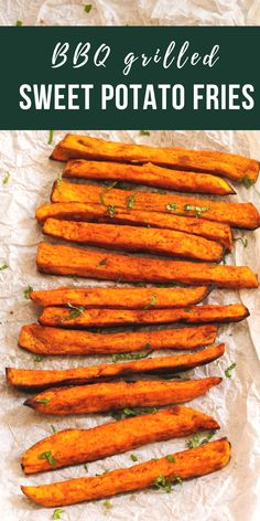 baked sweet potato fries with parsley on top and the words, bbq grilled sweet potato fries